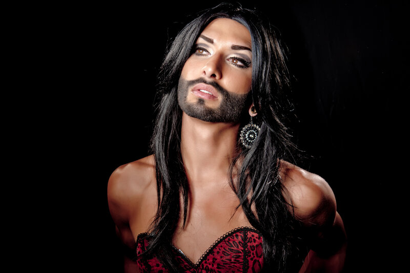 person with long hair and makeup