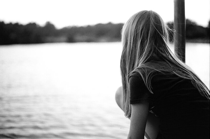 Person with Long Hair — Black, Contemplative