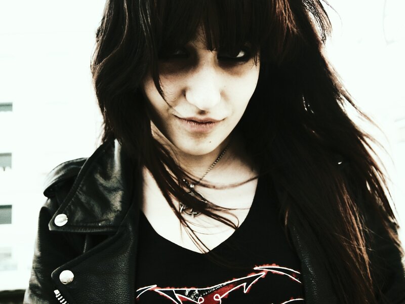 Person with Long Hair — Black, Dramatic, Photograph, Leather Jacket, Necklace