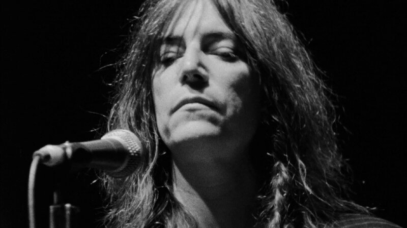 Person with Long Hair Singing