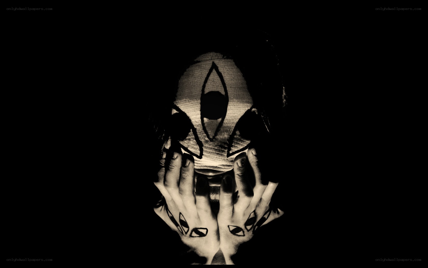 person with mask and painted hands