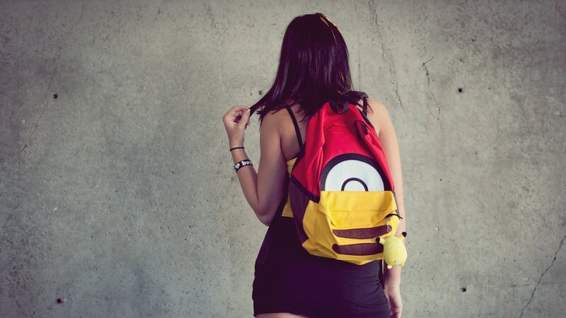 person with minion backpack