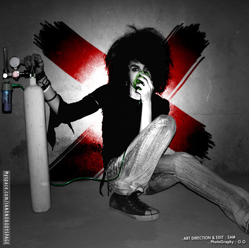 person with oxygen mask and gas cylinder