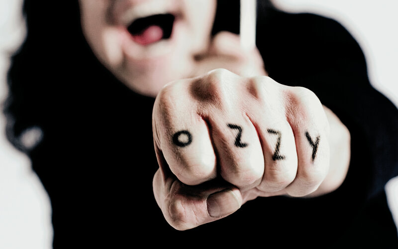 person with ozzy tattoo