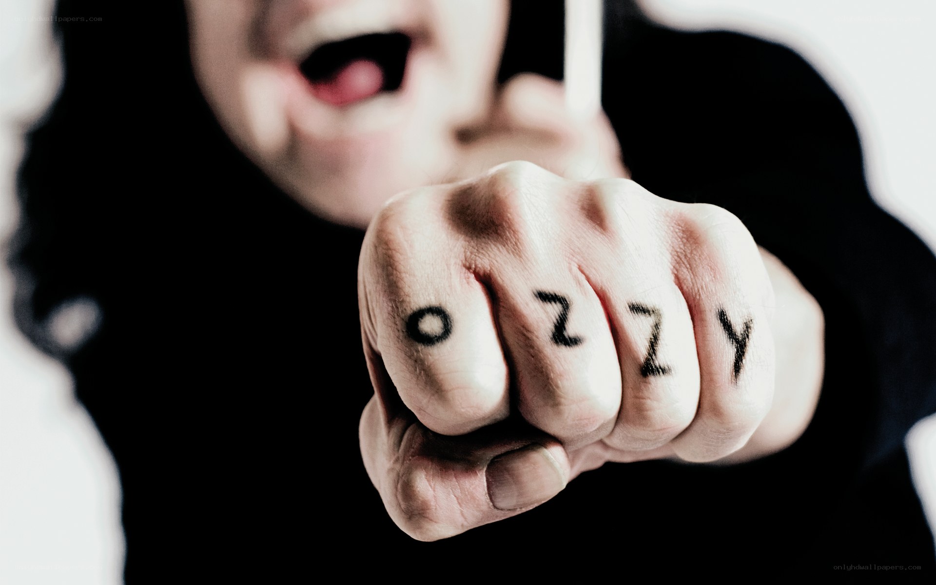 person with ozzy tattoo