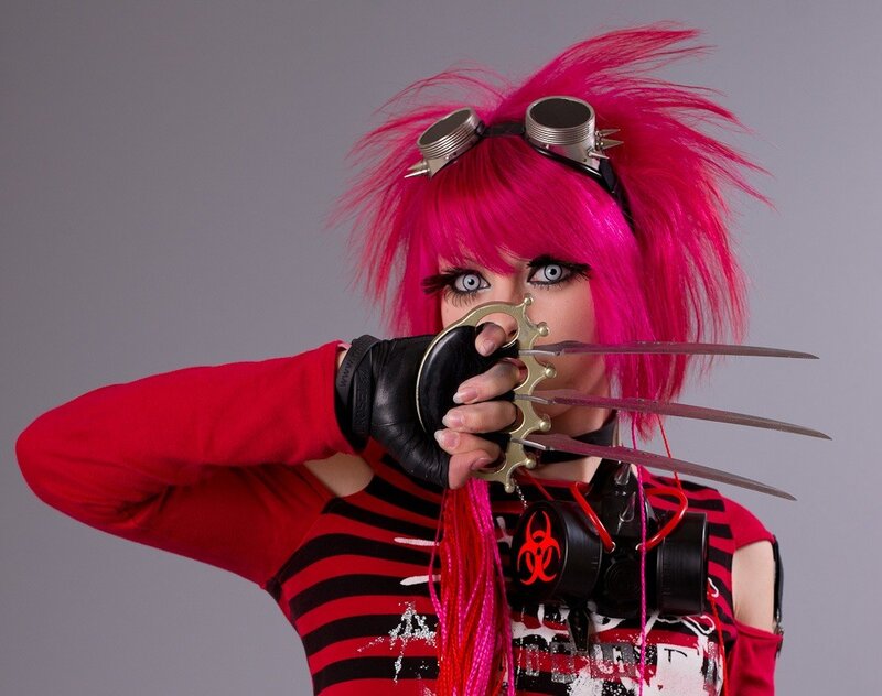 person with pink hair and claws