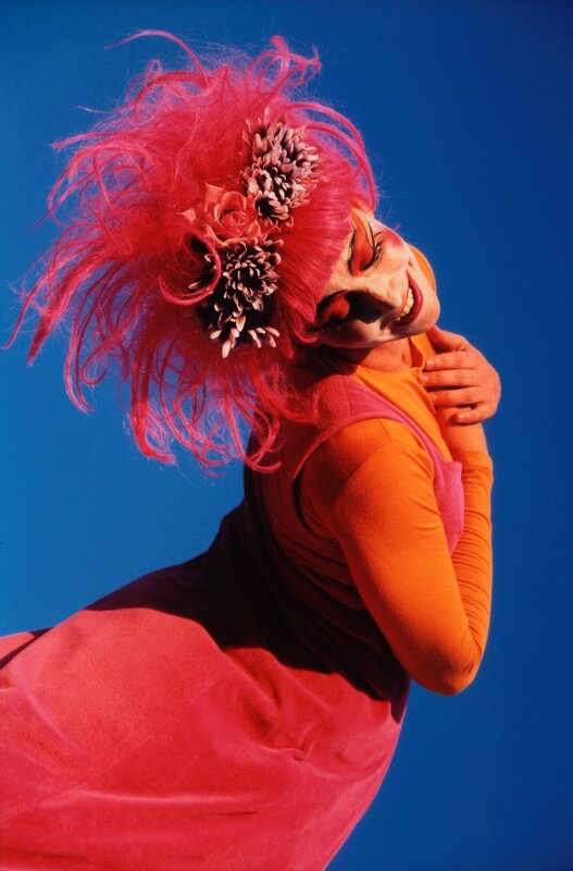 person with pink hair and makeup