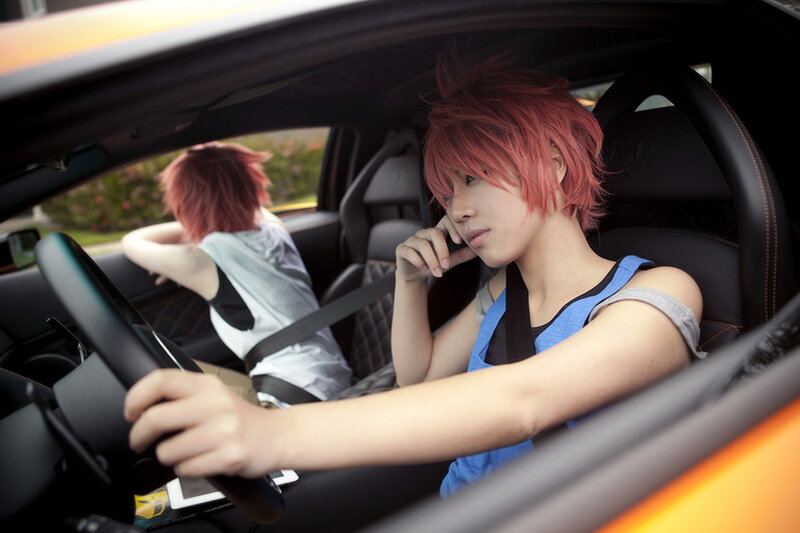 Person with Pink Hair in Car