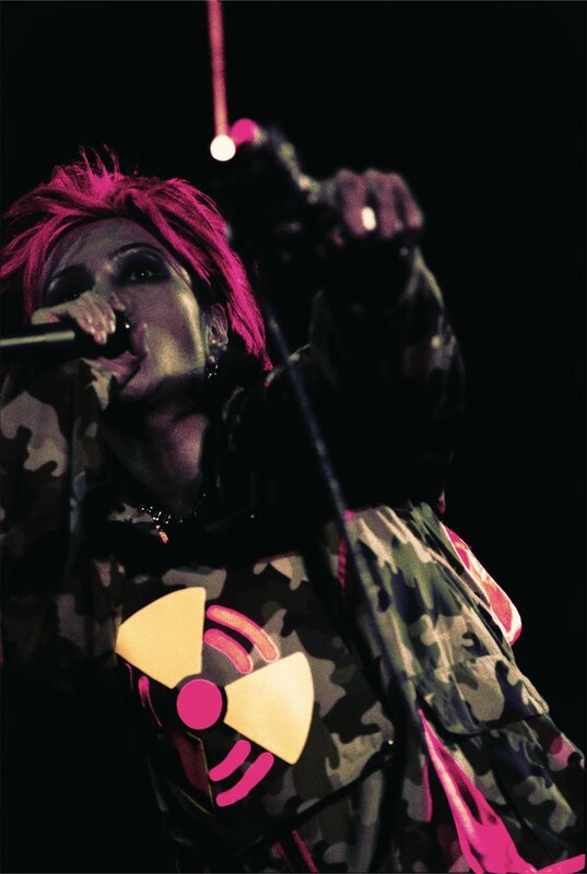Person with Pink Hair Singing