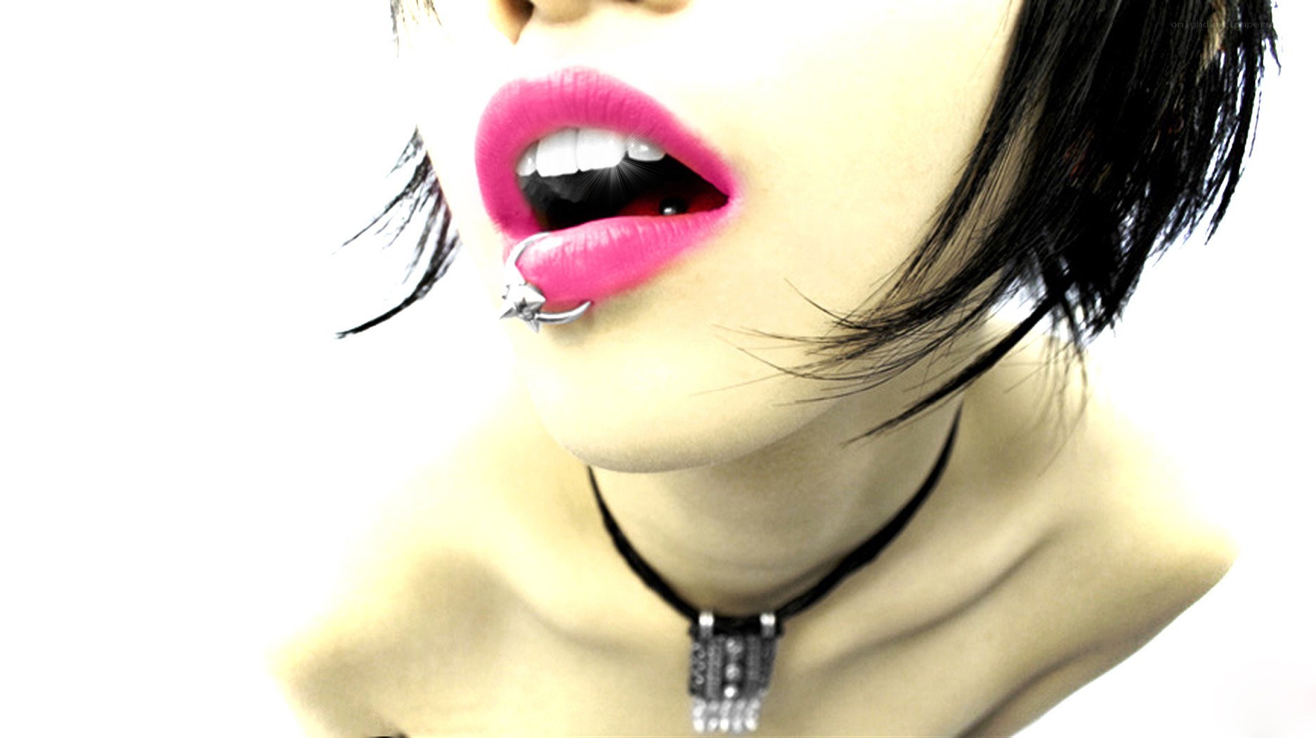 person with pink lips and lip ring