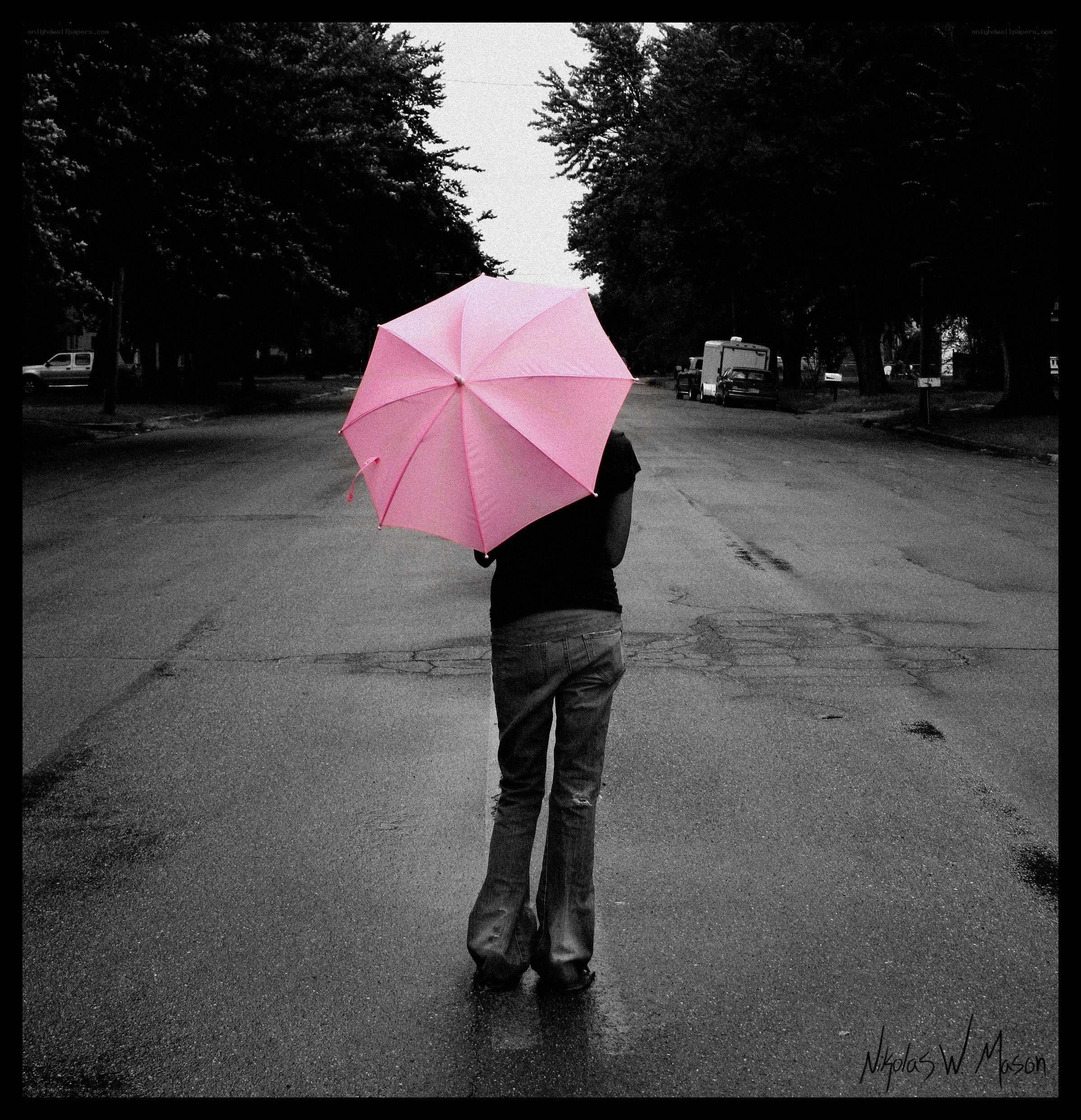 person with pink umbrella