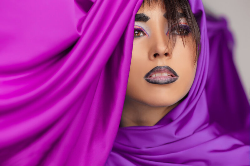 Person with Purple Fabric