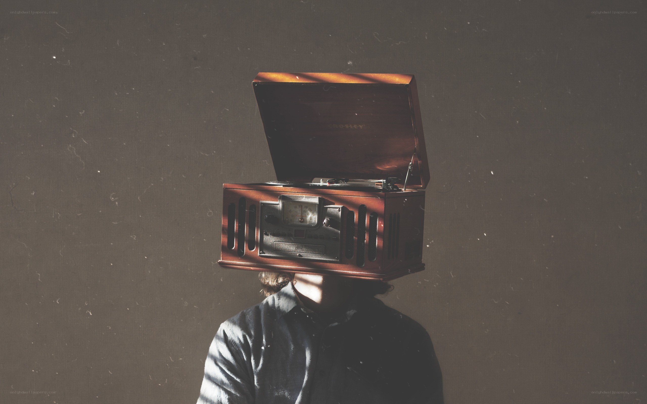 person with record player on head