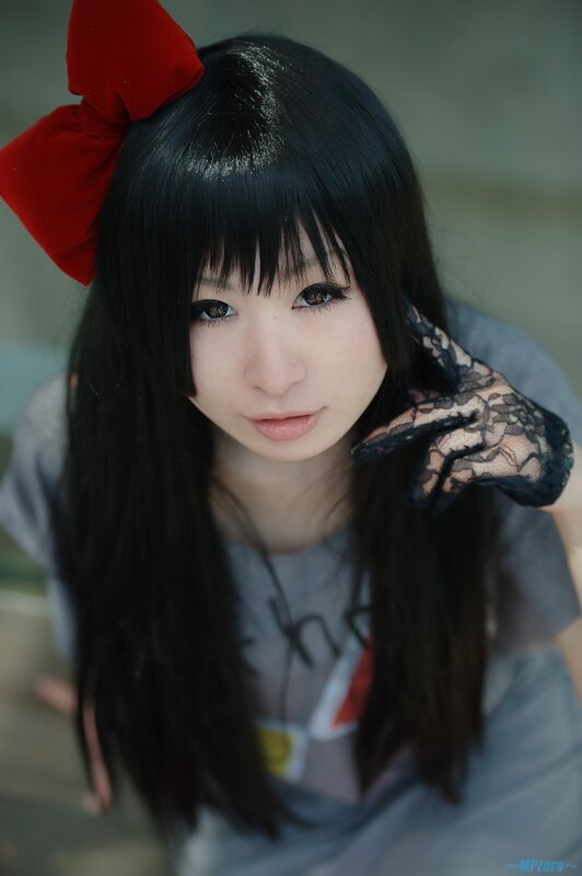 Person with Red Bow