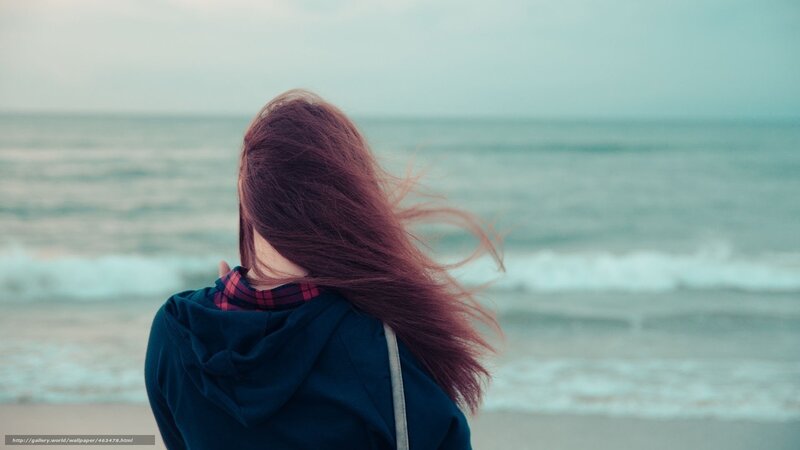 Person with Red Hair at Beach