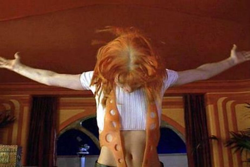 person with red hair dancing