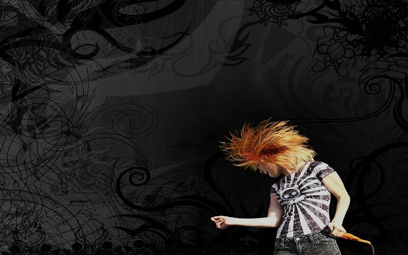 person with red hair dancing