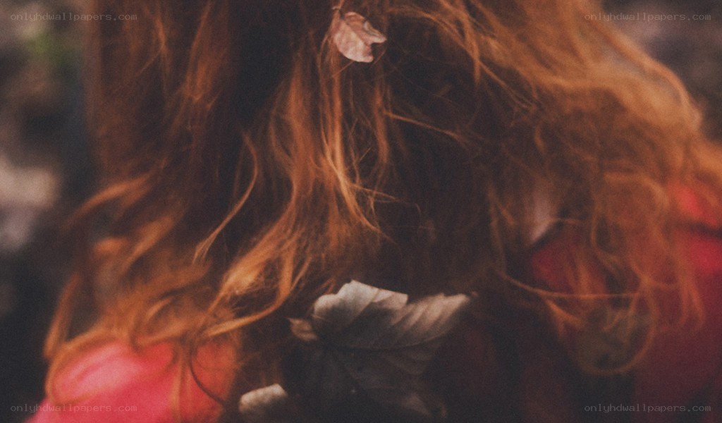 person with red hair from behind
