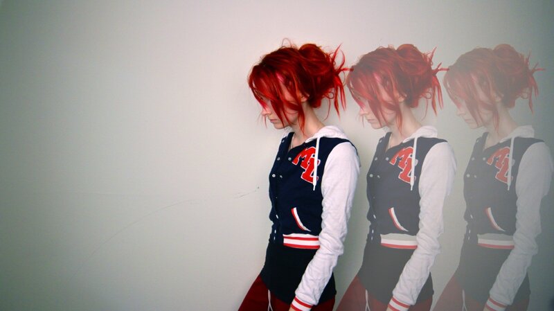 person with red hair in motion