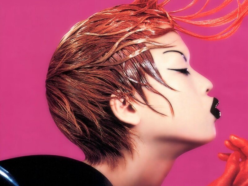 person with red hair in profile