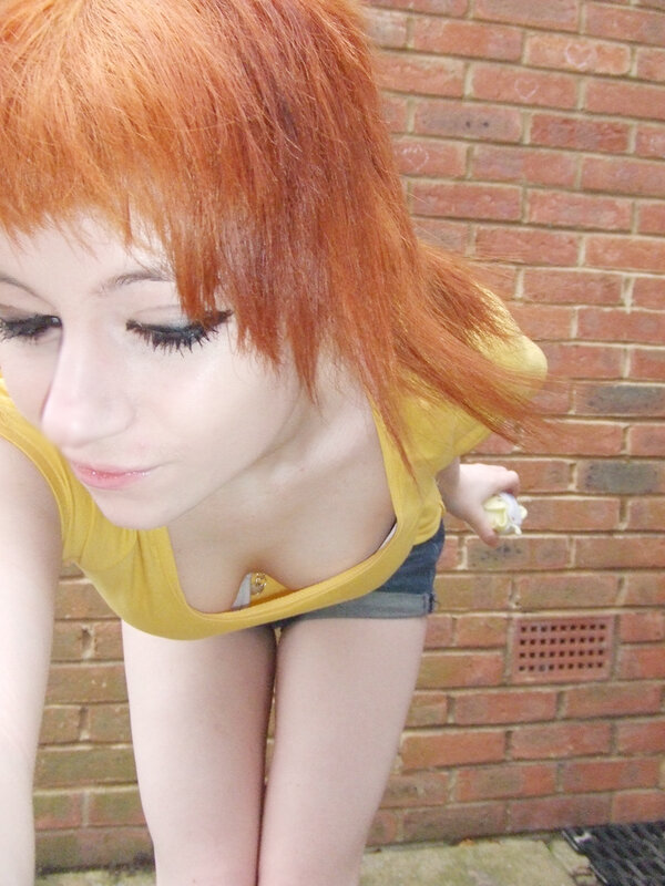 person with red hair leaning