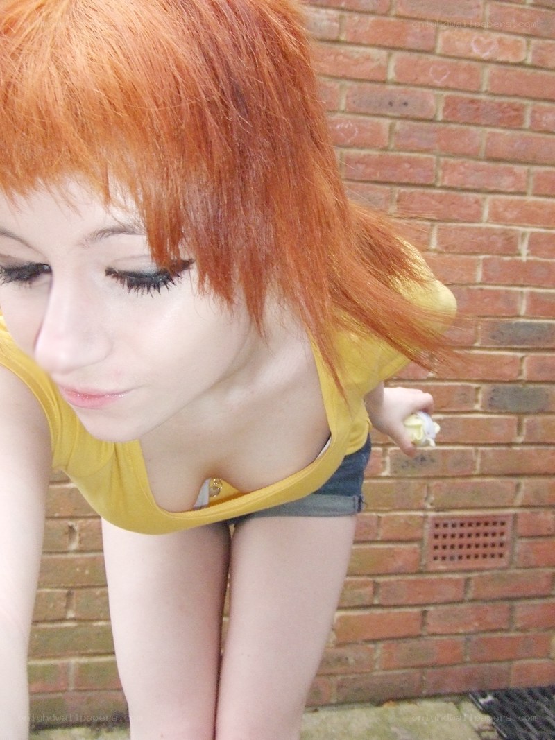 person with red hair leaning