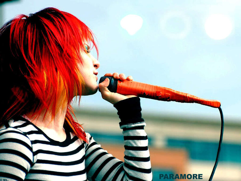 Person with Red Hair Singing — Energetic, Afternoon, Photograph, Microphone