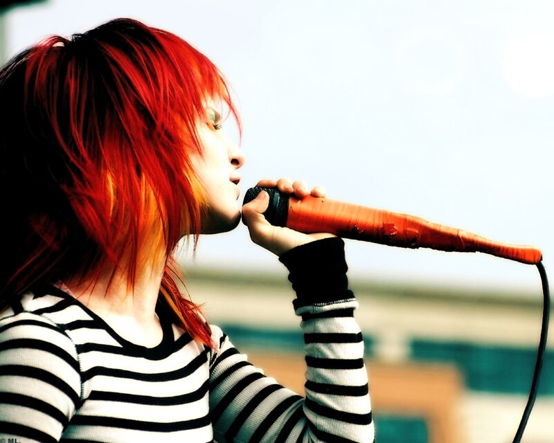 Person with Red Hair Singing — Energetic