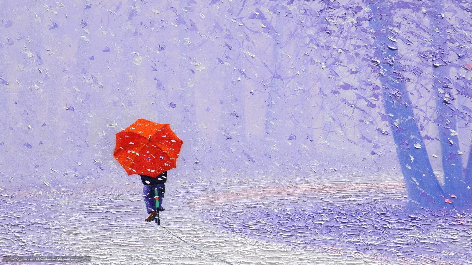 Person with red umbrella in snow