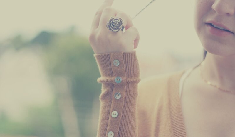person with rose ring