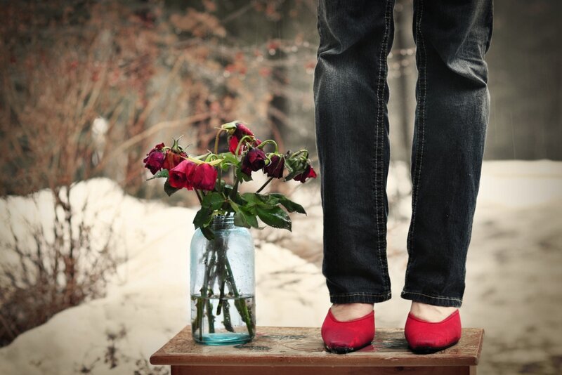 Person with Roses in Snow