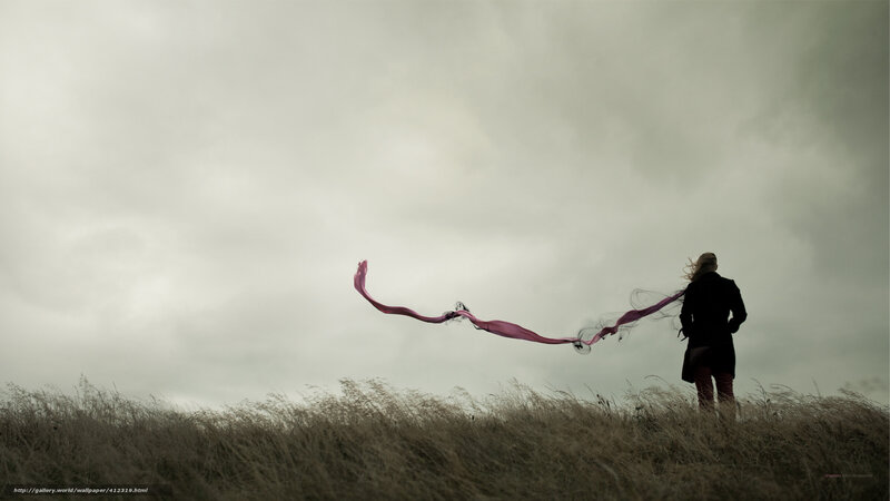 Person with scarf in field