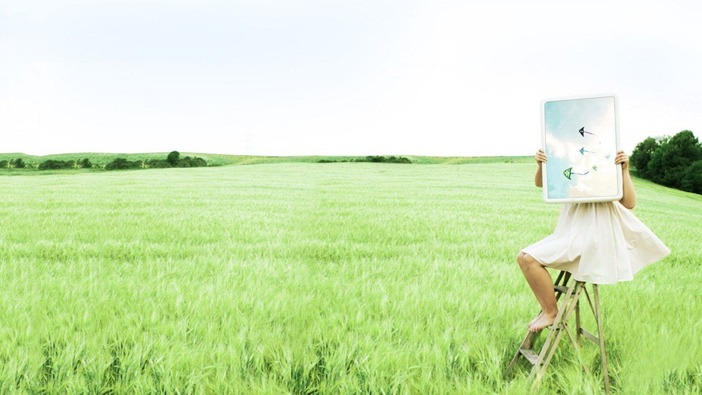 Person with screen in field