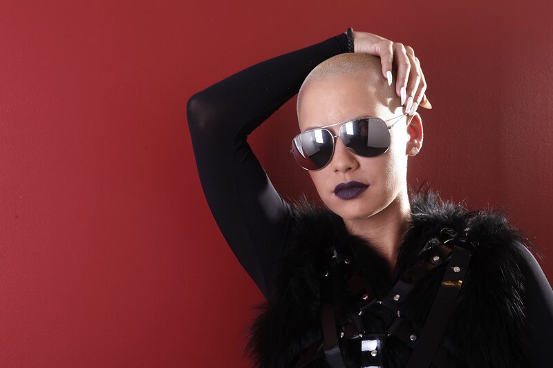 Person with Shaved Head — Red, Dramatic