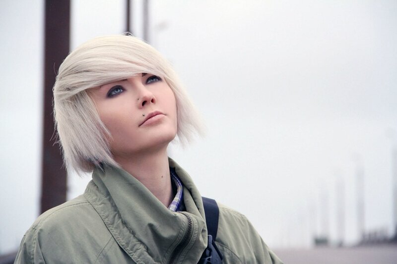 person with short blonde hair