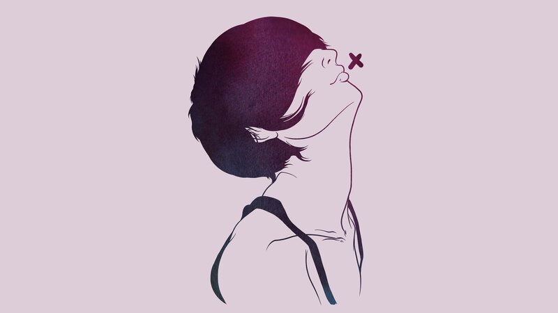 person with short hair looking up