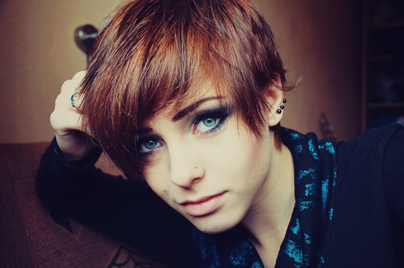 person with short red hair