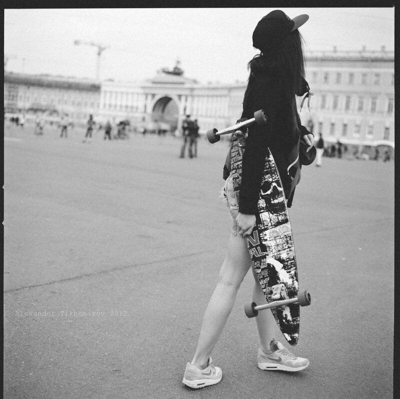 Person with Skateboard — Black