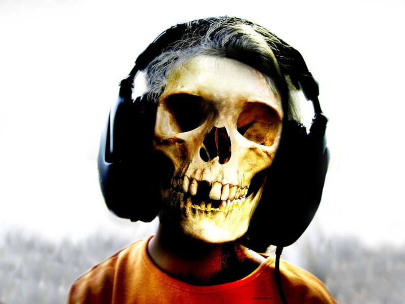 person with skull face and headphones