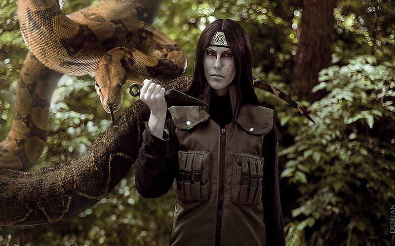 Person with Snake in Forest