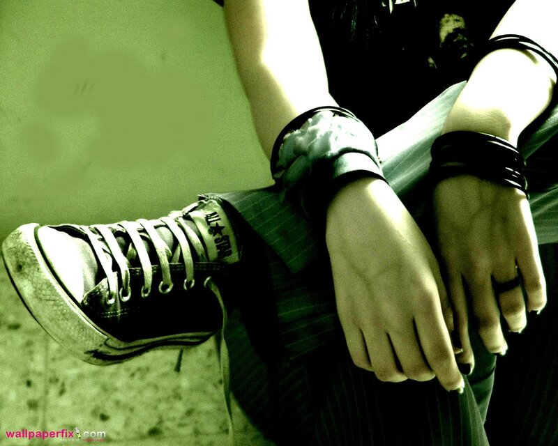 person with sneakers and bracelets