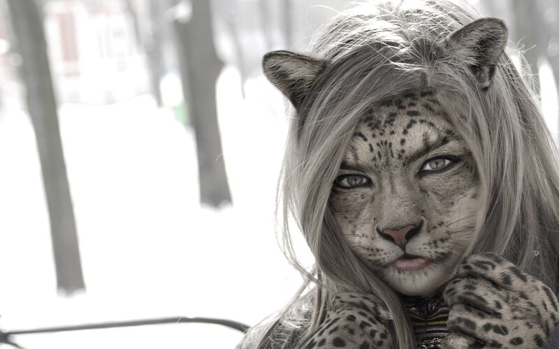 person with snow leopard makeup