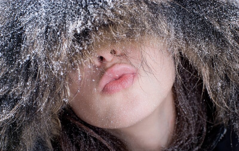 person with snow on face