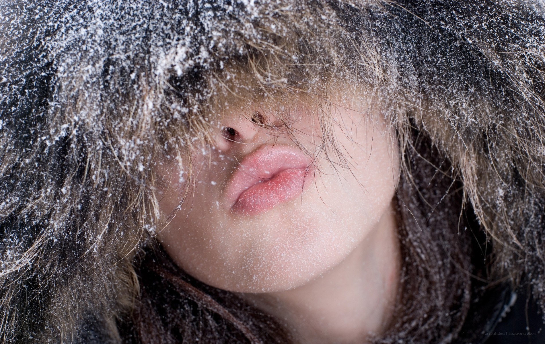person with snow on face