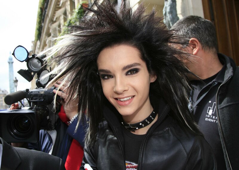 person with spiky hair at event