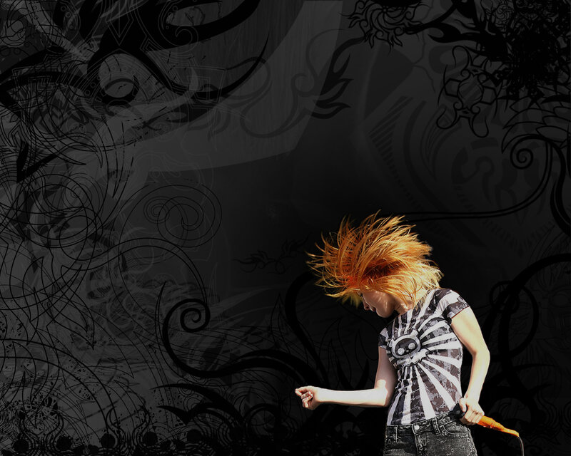 person with spiky hair on stage