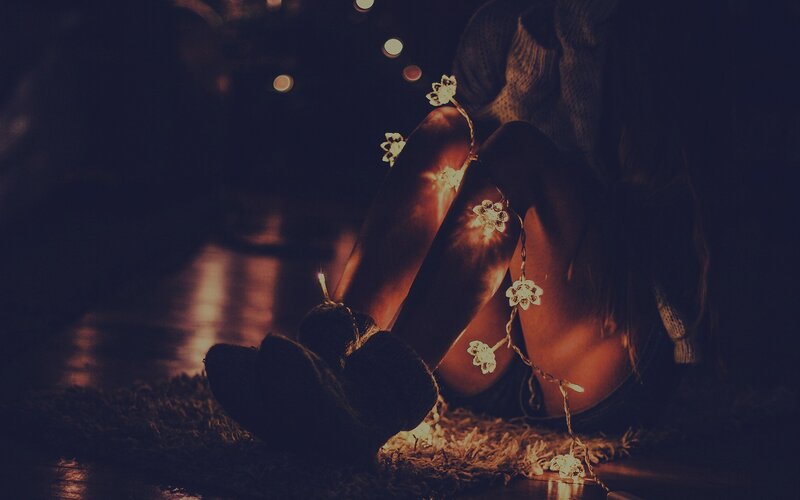 person with string lights