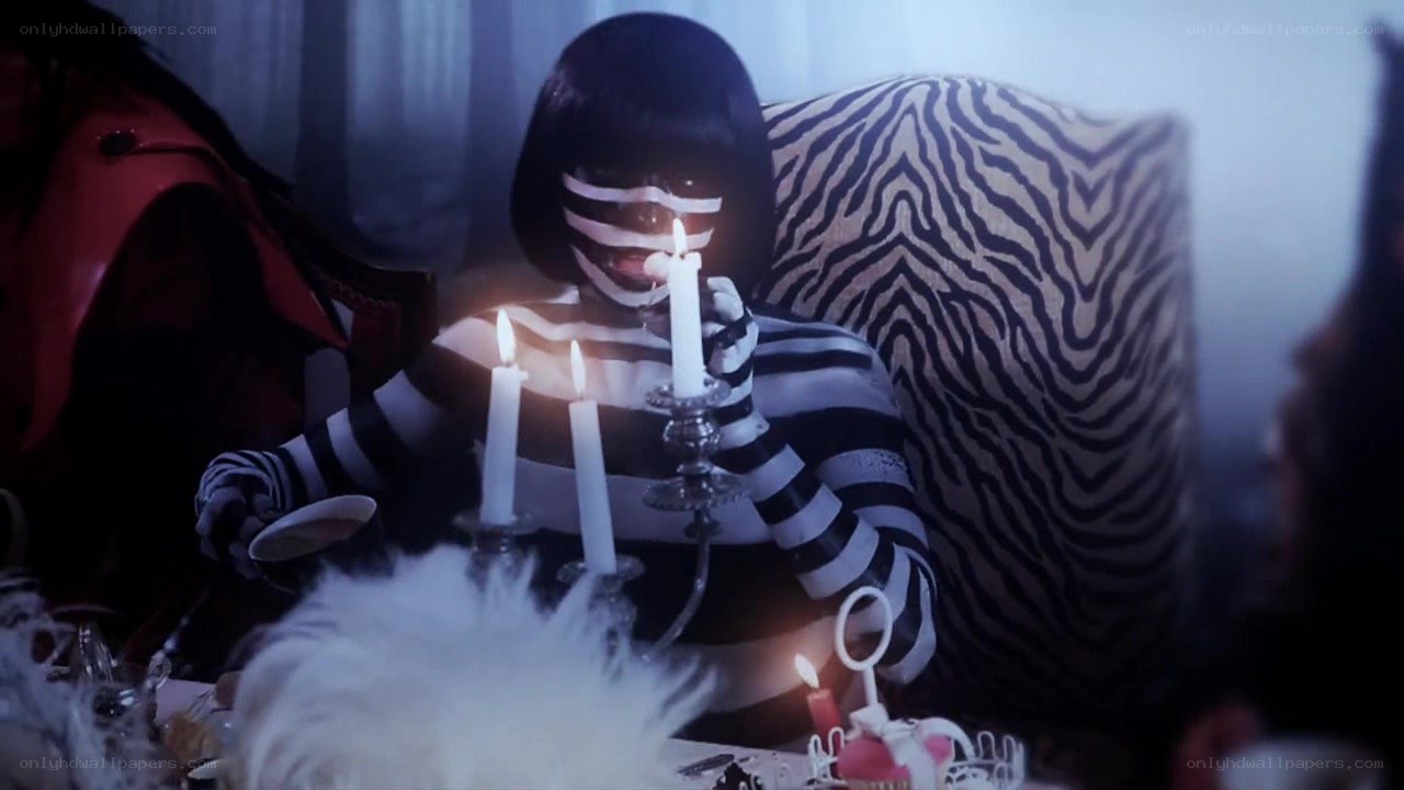 person with striped face mask