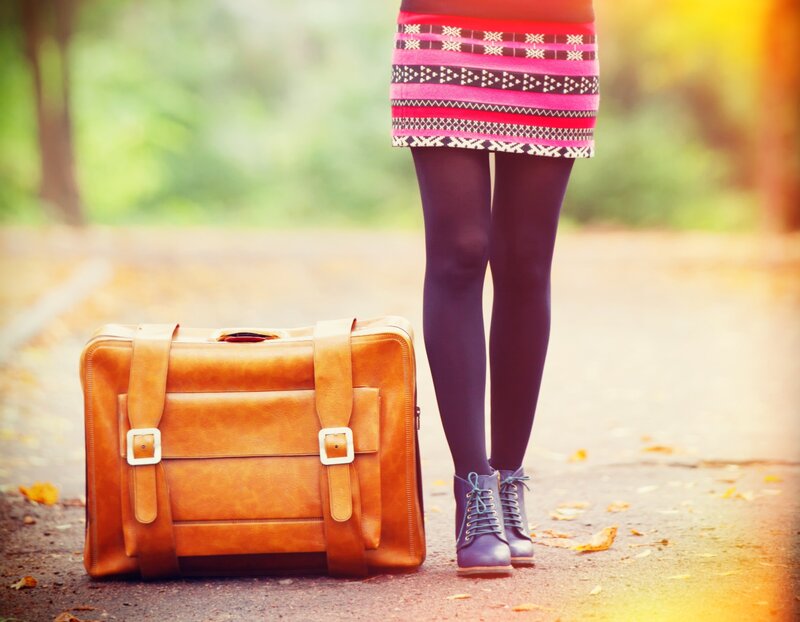 Person with Suitcase