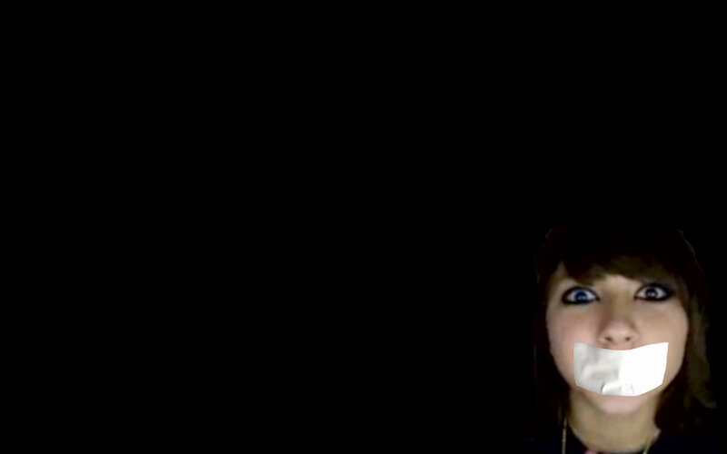 person with tape over mouth